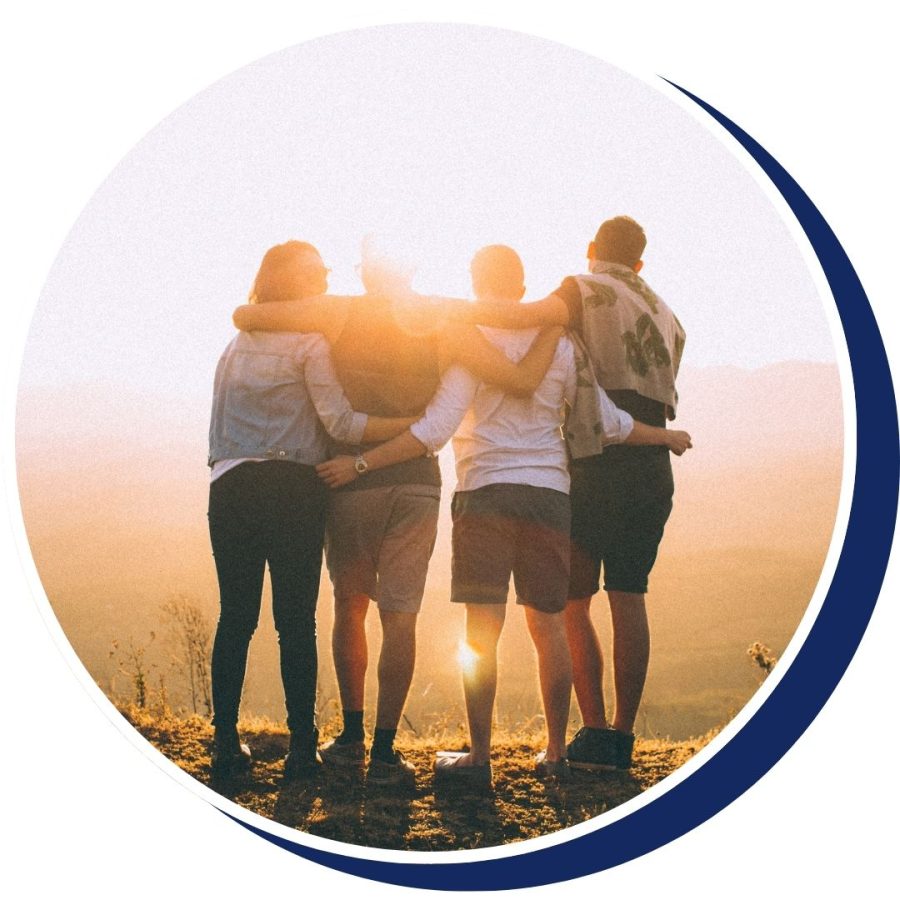 a group overlooking a scenic view